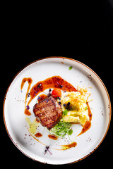 Wall Mural - Grilled beef steak filet mignon with potato and sauce in plate