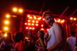 © bernardbodo - Ginger man dancing to music at concert
