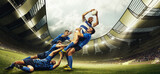 Fototapeta Sport - Professional sport. Men, rugby players during game, catching ball at 3D open air stadium. Blurred audience on background. Emotions. Concept of match, sport, competition, action and motion, game, cup.