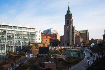 Myeongdong Catholic Cathedral locate at Myeongdong shopping street during winter sunny day at Jung-gu , Seoul South Korea : 2 February 2023