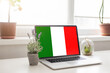 © Angelov - laptop with LEARN ITALIAN on a screen. Education learning italian language school concept
