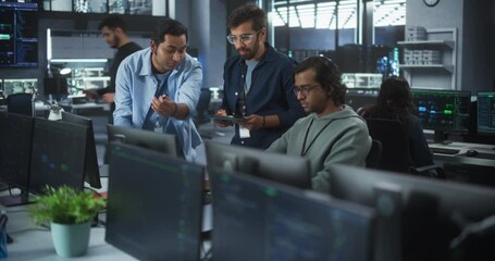 Wall Mural - Team of Three Multiethnic Diverse Software Developers Talk, Discuss and Collaborate on an AI Project. Empowered Young Indian Specialists Work on Digital E-Commerce Startup Business