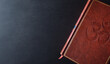 © Davizro Photography - Background with sacred book with engraved hindu symbol top view