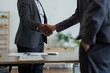 © Jirapong - african american and asian people hand shaking successful corporate partnership deal welcoming opportunity in office agreement professional greeting meeting colleagues partners