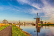 © Noppasinw - Rotterdam Netherlands, nature landscape of Dutch Windmill at Kinderdijk Village