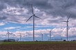 Wind Turbines in the field. Renewable energy with wind turbines.