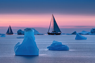 Wall Mural - The silhouette of a yacht floating on the sea of drift ice dyed in the sunset, Generative AI