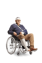 Poster - Mature man with a broken arm and bandage on head sitting in a wheelchair