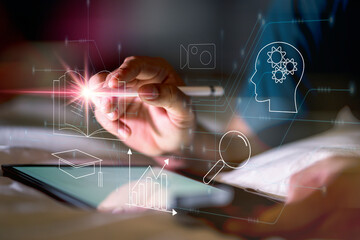 Fototapete - Concept of Online education. man use Online education training and e-learning webinar on internet for personal development and professional qualifications. Digital courses to develop new skills.