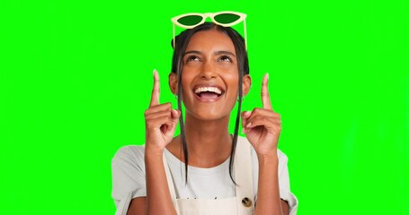 Sticker - Green screen woman, excited face and pointing up at commercial promotion, advertising space or marketing mock up. Mockup portrait, product placement and female chroma key model on studio background