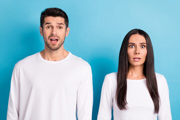 Sticker - Photo portrait of nice young guy girl astonished frightened make mistake wear trendy white garment isolated on blue color background