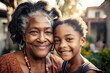 © TRINETTE + CHRIS - Black grandmother and granddaughter portrait outdoors smiling, closeup. Generative AI.