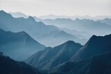 Fototapeta Natura - layers of mountains - minimalistic foggy view