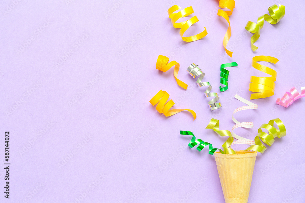 Composition with ice cream cone on lilac background