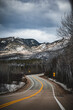 Vertical shot of an asphalt road in a mountainous background in Ile Perrot, Quebec, Canada