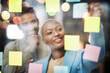 © A. Frank/peopleimages.com - Planning, writing and business people in schedule, brainstorm or agenda, sticky note or innovation. Idea, partnership and happy black woman leader with solution goal, visual or problem solving answer