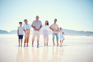 Poster - Portrait of big family on beach walking together, grandparents and parents with kids smile together on vacation. Sun, fun and ocean happiness for hispanic men, women and children on summer holiday.