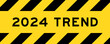 Yellow and black color with line striped label banner with word 2024 trend