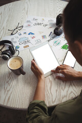 Sticker - Businesswoman using digital tablet at creative office desk