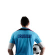 Uruguay football player holding ball