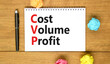 © Dzmitry - CVP cost volume profit symbol. Concept words CVP cost volume profit on white note on beautiful wooden table wooden background. Pen. Business and CVP cost volume profit concept. Copy space.
