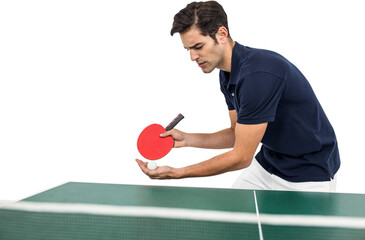 Wall Mural - Confident male athlete playing table tennis