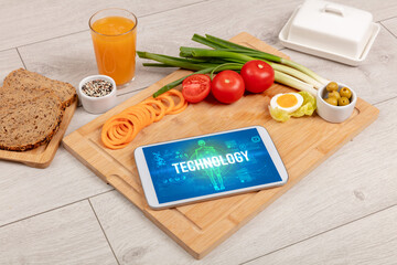 Tablet Pc with fruits, medical concept