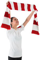 Wall Mural - Football fan waving red and white scarf