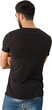 © vectorfusionart - Rear view of man standing with arms crossed