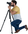 Full length of photographer photographing through camera while kneeling