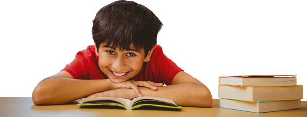 Sticker - Portrait of boy reading book in library