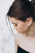 © Ananass - Stylish portrait of a young girl with gypsophila flowers and natural light, natural girlish beauty without makeup, minimalism and sophistication.