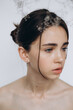 © Ananass - natural girlish beauty without makeup, minimalism and sophistication. Stylish portrait of a young girl