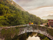 © Sangiao_Photography - Trubia Asturias river bridge in Spain, Europa. mixed race latin and indian middle aged couple
