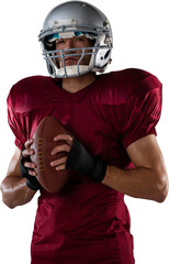 Wall Mural - Portrait of determined sportsman with American football