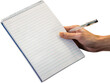 Human hand holding note pad and pen