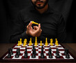 © Narayan - latin man with beard challenging in chess game, chess concept