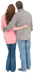 Wall Mural - Casual couple standing arms around