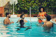 © Lomb - Summer Pool Party with Multiethnic Friends
