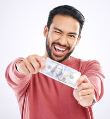 Wall Mural - Money, cash and portrait of man wink on white background for investment, financial savings and payment. Finance profit, winner and excited male for winning, bonus and stock market success in studio