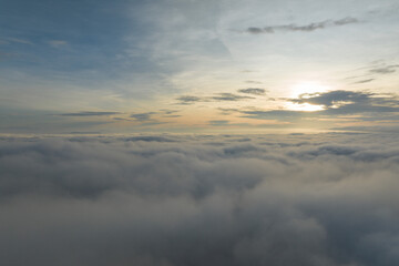 Wall Mural - sunset over the clouds