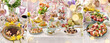 Easter banner with traditional Polish dishes and pastries on festive table