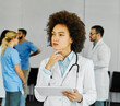© Lumos sp - doctor nurse portrait woman hospital group team medical uniform health tablet serious thinking working idea concentration planning problem thoughtful creative  solution computer technology