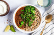 © Michael Marquand - Bowl of lentils and rice with broccoli