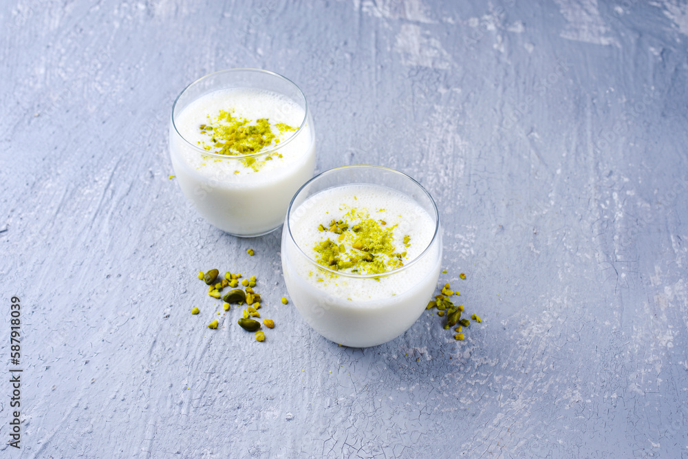 Traditional Indian lime lassi drink with dahi yogurt, lime and chopped ...