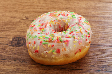 Wall Mural - Sweet glazed vanilla donut with icing