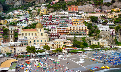 Wall Mural - Panoramic aerial view of Positano coastline from a moving drone, Campania - Italy.