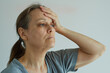 © evafesenuk - Retired woman suffering from headache, depression, melancholy.