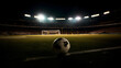 Soccer game with the ball in the middle of the image and the goal behind giving it a dramatic and epic touch of suspense.