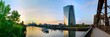 EZB mit der Skyline Frankfurts und dem Main.